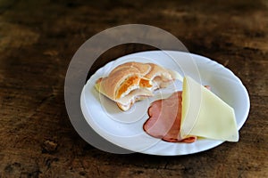 Bitten Bun with ham and cheese