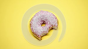 Bitten donut, fatty junk food, sugar addiction during premenstrual syndrome