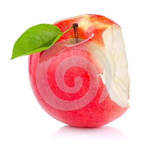 Bitten red juicy apple with green leaf isolated