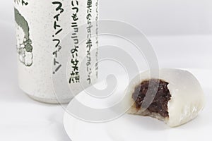 Bitten White Mochi with Japanese Tea Cup