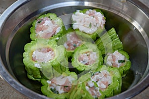 Bitter gourd filled with chopped pork, a traditional chinese dish.