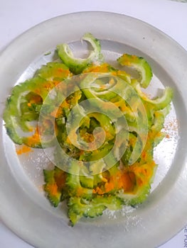 Bitter gourd and turmeric   with white backround