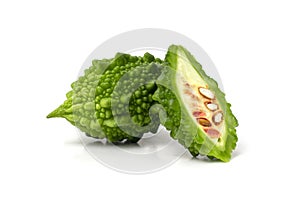 Bitter melon and Bitter gourd with half sliced isolated on white background