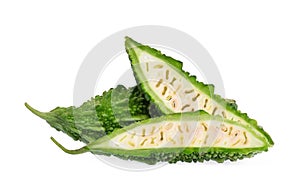 Bitter melon with half slice isolated on white