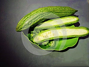 Bitter melon, pariah, or bitter gourd are usually cultivated for use as vegetables and medicinal ingredients.