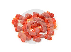Bitter melon seeds covered in sticky red pith
