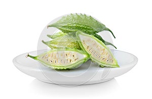 Bittermelon in white plate on white background