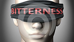 Bitterness can make things harder to see or makes us blind to the reality - pictured as word Bitterness on a blindfold to