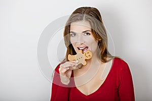 Bitting a Gingerbread cookie