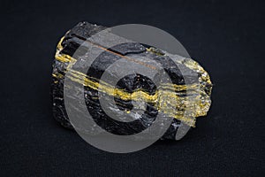 Bituminous coal piece sulfurous content causing yellow lines in structure