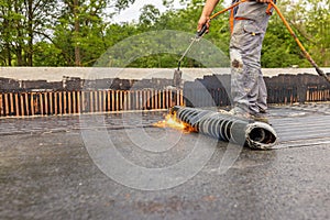 Bituminous membrane waterproofing system details and installation on flat rooftop