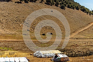 A bivouac in the Atlas mountains with a berber tent, Morocco.