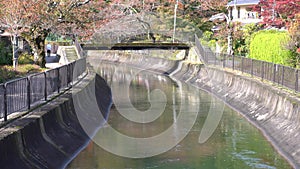 Biwa Lake Canal or Biwako Sosui viewed from Anshu bridge in Yamashina, Kyoto, in autumn
