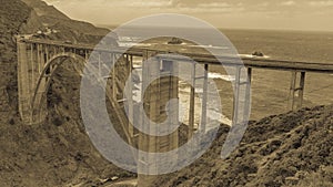 Bixby bridge on Route 1, Pacific Coast Highway (PCH) with spring flowers lining road