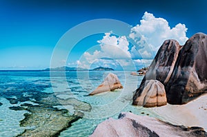 Bizarre huge granite rocks boulders at the famoust Anse Source d`Argent beach on island La Digue in Seychelles. Exotic