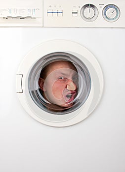 Bizarre man inside washing machine