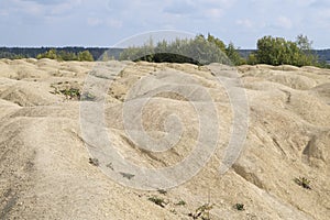 Bizarre relief on the waste heap of the old Bornitsky quarry, Leningrad region. Russia