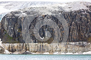 Bizarre rock formation. Alkefjellet, one of the largest and most spectacular bird cliffs on Svalbard.