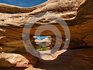 A bizarre rock formation with tunnel and cave