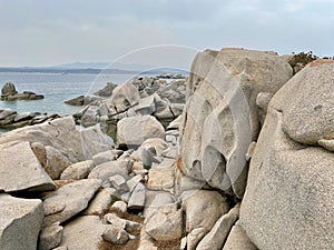 Bizarre rock formations, tafoni, on Lavezzi Island, maritime reserve in Corsica, France. photo