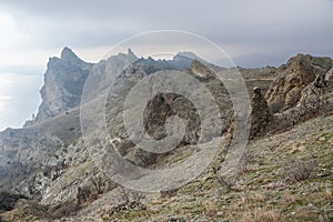 Bizarre rocks in Dead city. Khoba-Tele Ridge of Karadag Reserve in spring. Crimea