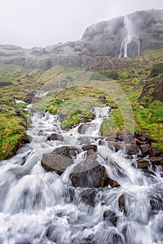 Bjarnarfoss waterfall at the western end of the Snaefellsnes peninsula, Iceland. Amazing dramatic landscape