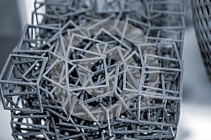 Black abstract model object printed on 3d printer from powder close-up