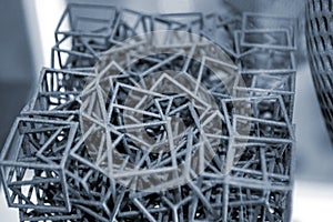 Black abstract model object printed on 3d printer from powder close-up