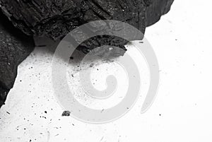 Black abstract textured composition on a white background