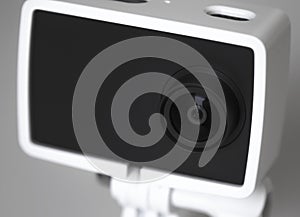 Black action camera, isolated on grey background