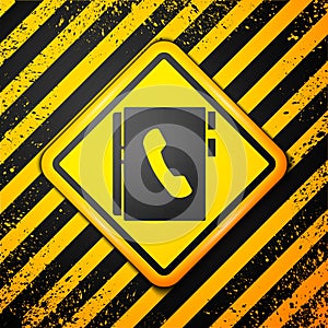Black Address book icon isolated on yellow background. Notebook, address, contact, directory, phone, telephone book icon
