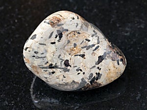 black aegirine in tumbled Sanidine and nepheline