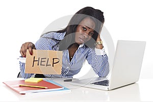 Black African American ethnicity frustrated woman working in stress at office photo