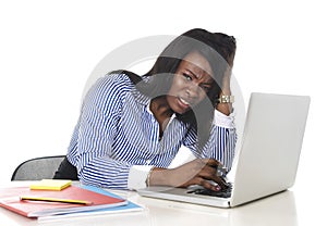 Black African American ethnicity frustrated woman working in stress at office