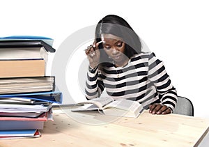 Black African American ethnicity student girl studying textbook