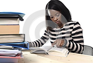 Black African American ethnicity student girl studying textbook photo