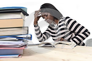 Black African American ethnicity student girl studying textbook