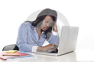 Black African American ethnicity worried woman working in stress at office