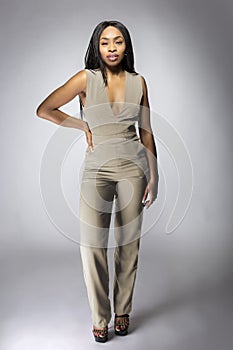 Black African American Fashion Model Wearing a Gray Jumpsuit