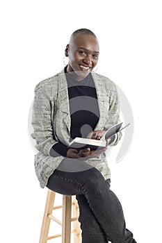 Black Female Author or Writer Posing with a Book