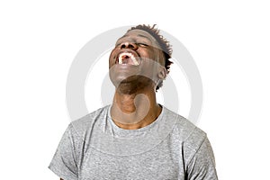 Black african american man laughing happy and excited isolated