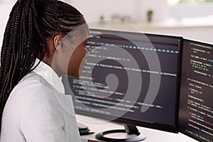 Black African coder develops complex web computing photo