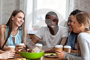 Black african guy spends time with friends attractive girls