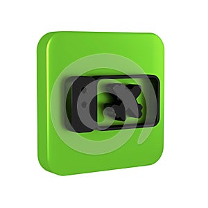 Black Airline ticket icon isolated on transparent background. Plane ticket. Green square button.