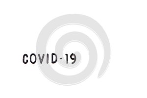 A black alphabet of the word Covid-19