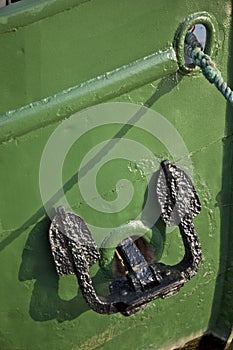 black anchor on green ship