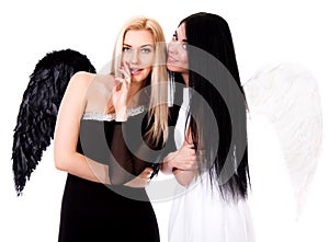 Black angel take counsel with a white angel photo