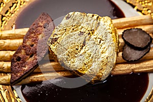 Black Angus 24 carat gold steak. Beef tenderloin, foie gras, fresh black truffle, white asparagus, port wine sauce
