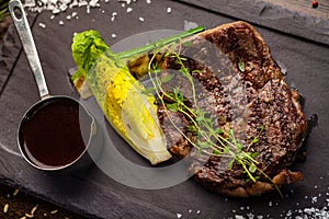 Black Angus Entrecote steak. Marbled steak from Uruguay. Delicious healthy traditional food closeup served for lunch in