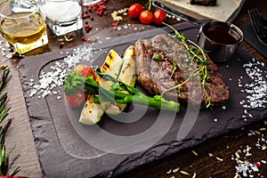 Black Angus New York steak. Marbled beef sirloin from Uruguay. Delicious healthy traditional food closeup served for